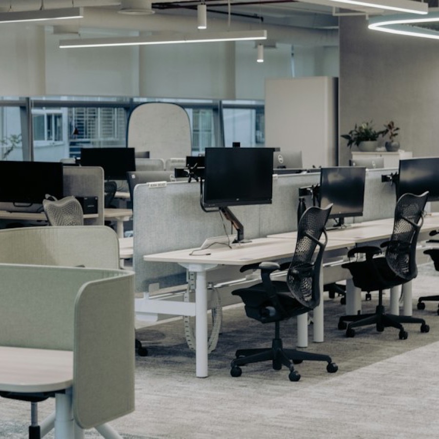 Open-plan office with desks and chairs